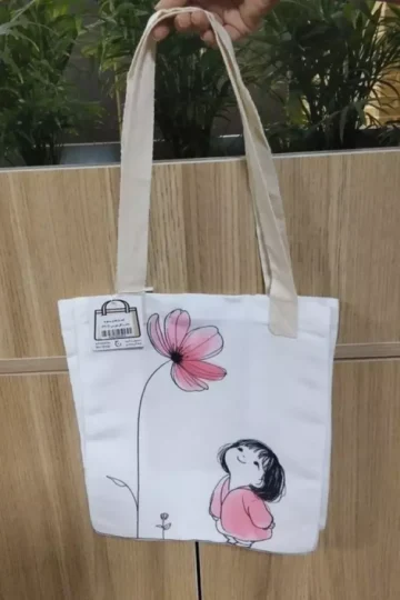 کیف پارچه ای 3 طرفه کاست 26*29 (طرح دختر و گل صورتی،کد 2209)